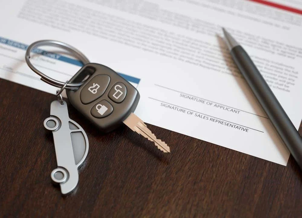 Early lease return paperwork being reviewed at BMW of Albany