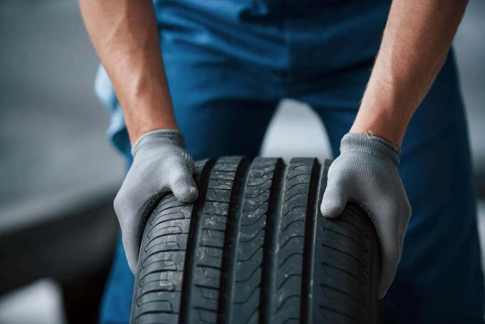 Close-up of car tires showing tread wear