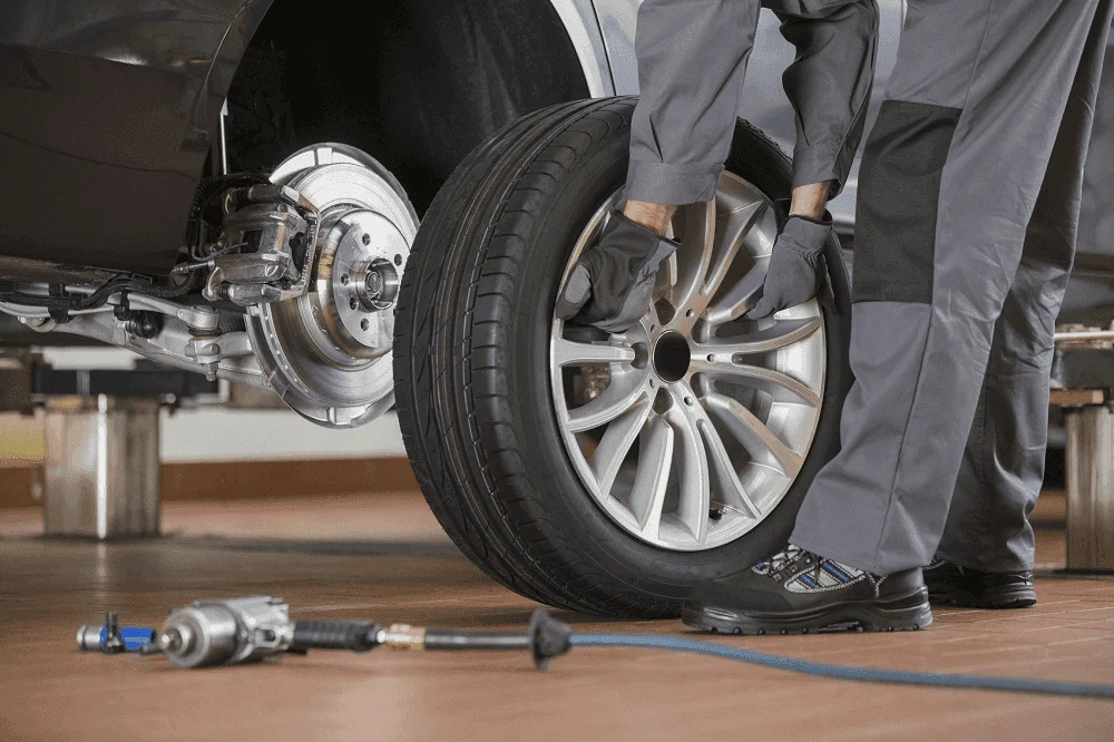Tire rotation at the BMW of Albany tire service center